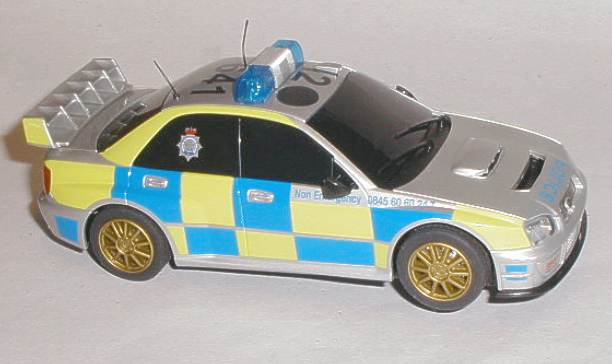 Greenhills Scalextric Subaru Impreza Police car front axle and wheels Gold C3... 