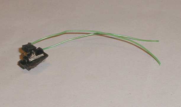 Pick up assembly